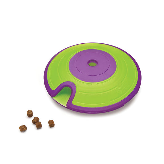 Interactive dog puzzle toy filled with treats for mental stimulation and enrichment play for dogs.